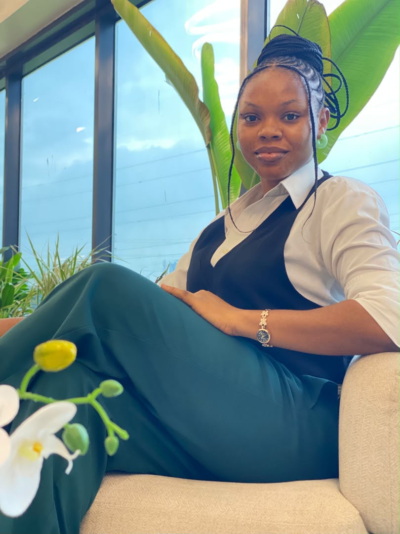 Comfort Uju in a professional setting